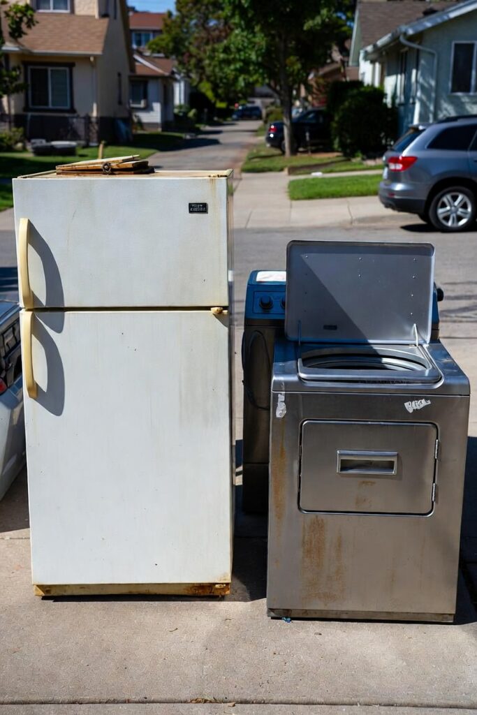 Old appliances ready for haul-away removal in Hanford California